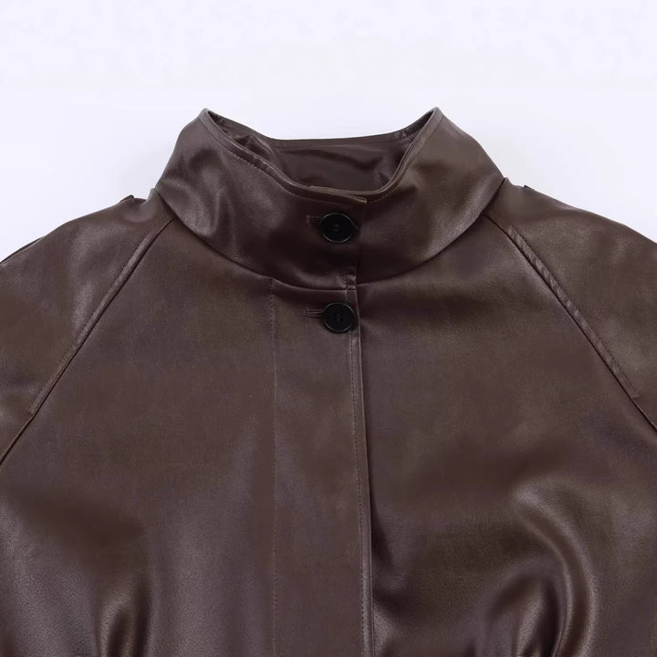 Women's oversized faux leather bomber jacket with stand-up collar, elastic hem, and concealed snap button placket Mune Fashion