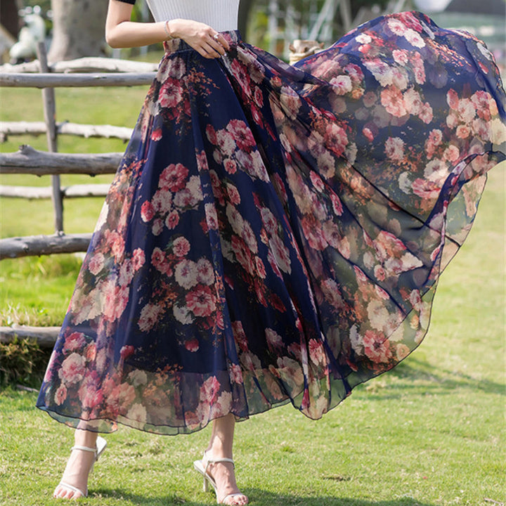 Women long pleated maxi skirt with floral summer print and elastic waistband Mune Fashion