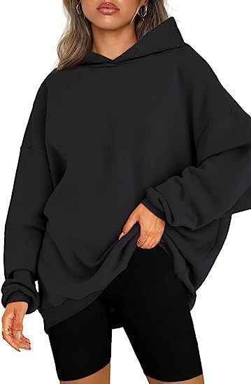 Women's oversized hoodie in longline cut with raglan sleeves and soft inner lining Mune Fashion