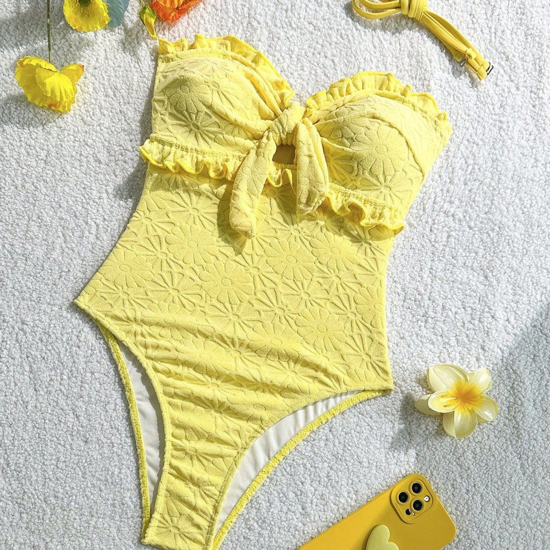 Women's swimsuit with playful ruffle design and trendy knot detail Mune Fashion