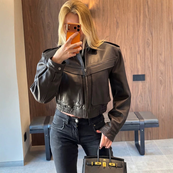 Women's short-cut leather jacket with elastic hem and patch chest pockets Mune Fashion