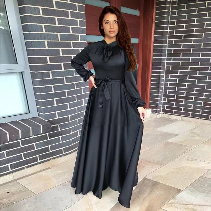 Women's maxi dress made of flowing satin with stand-up collar and tie belt Mune Fashion