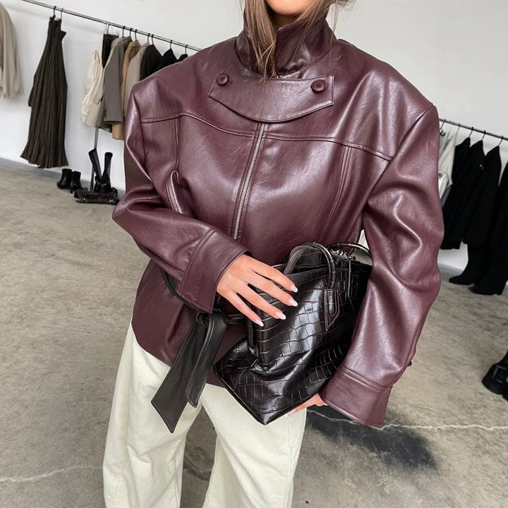 Women's Boxy Faux Leather Jacket with High Stand Collar, Front Zip and Waist Belt Mune Fashion