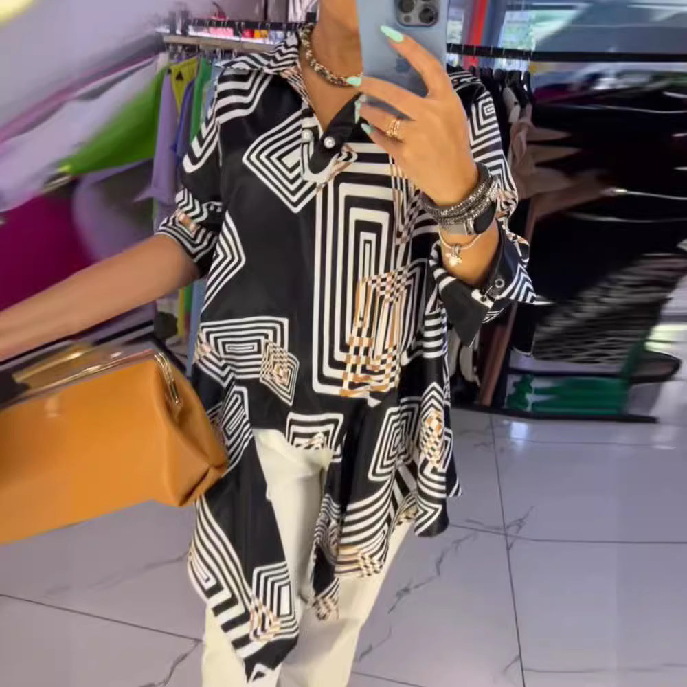 Women’s loose silk-look blouse with graphic square print, asymmetrical hem and mother-of-pearl button placket Mune Fashion