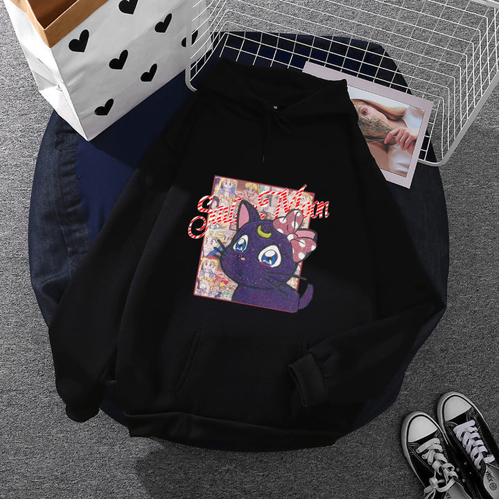 Women's oversized hoodie with shimmering anime cat motif, kangaroo pocket, and soft fleece lining Mune Fashion