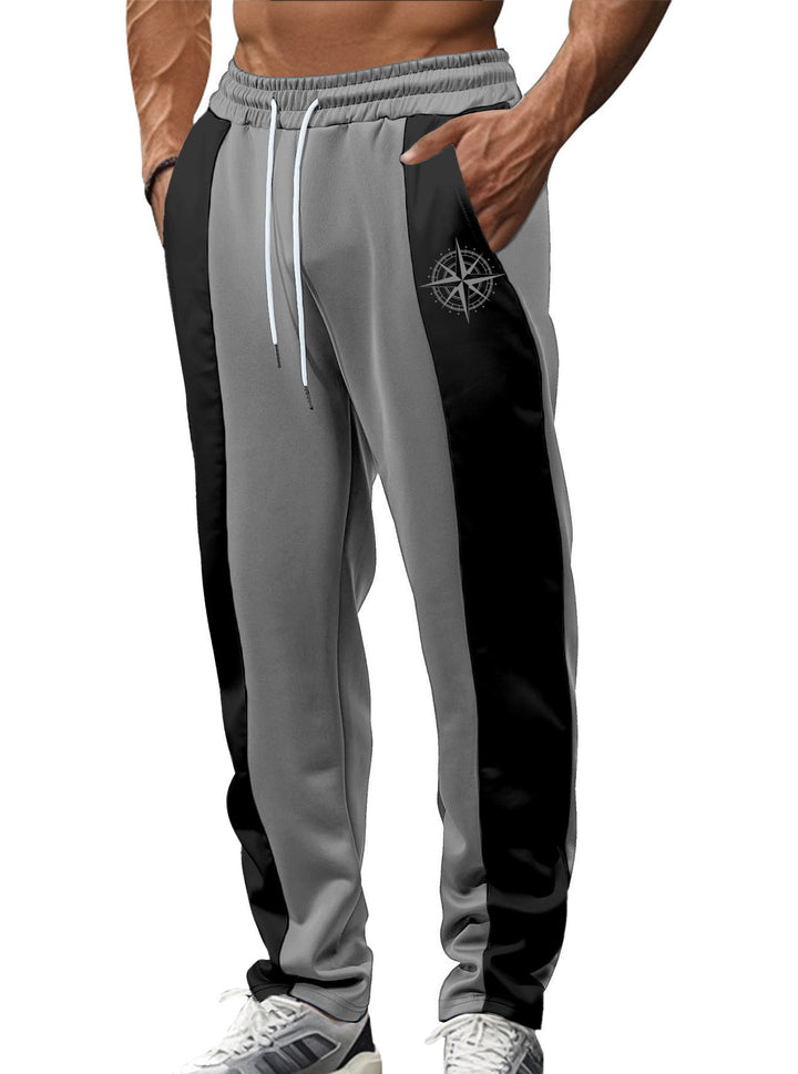 Men's sporty track pants with side contrast stripes, elastic waistband, drawstring, and deer embroidery Mune Fashion