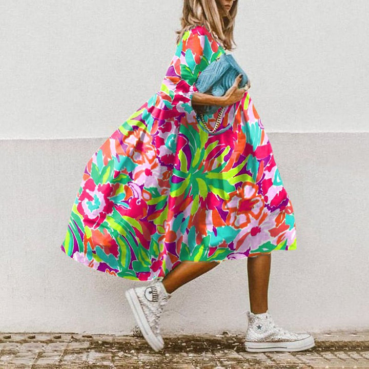 Ladies nan lightweight cotton swing dress with large floral print, 3/4 balloon sleeves and gathered waist Mune Fashion