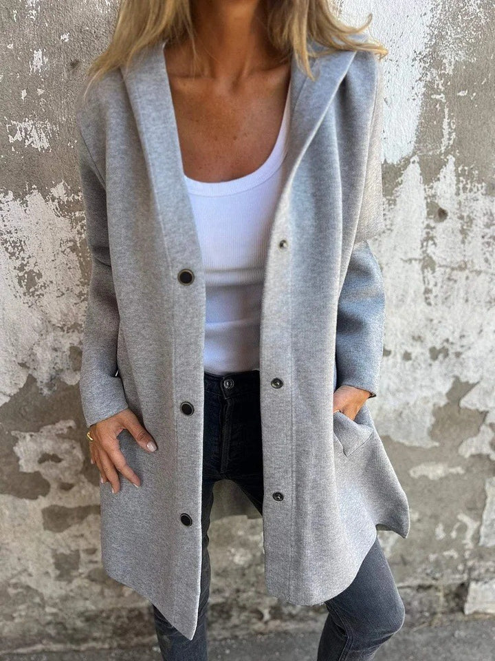 Women's hooded coat with snap button placket and straight oversized cut Mune Fashion