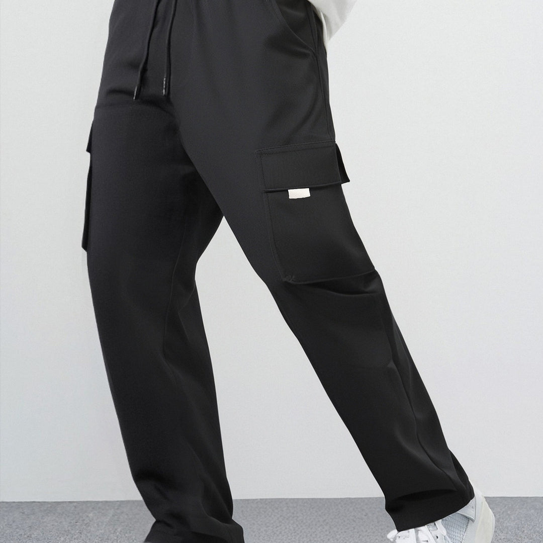Men's loose cargo casual pants made of lightweight functional fabric with large flap pockets Mune Fashion