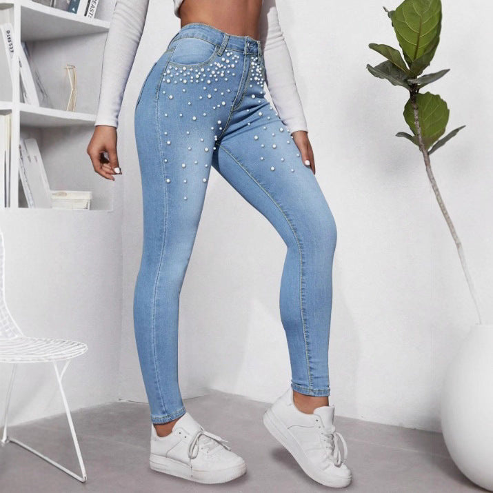 Ladies High-Waist Skinny Jeans with decorative pearl cluster and sculpting cut Mune Fashion