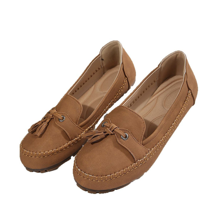 Ladies  classic moccasin slippers with tassels, hand-stitched frame seam and non-slip rubber sole Mune Fashion