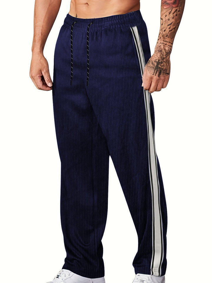 Men's knitted relaxed joggers with wide leg, side piping, and elastic drawstring waistband Mune Fashion
