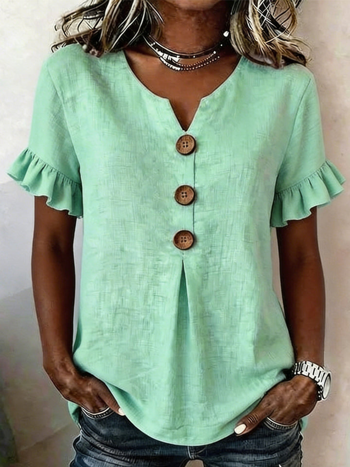 Women's top with ruffled hems and button details Mune Fashion