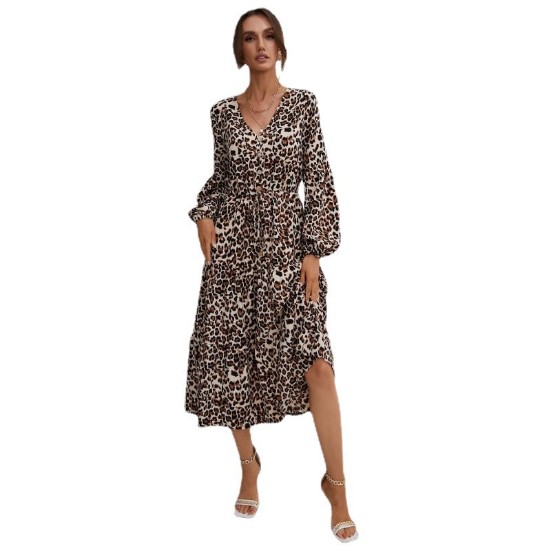 Women’s midi dress in leopard print with V-neckline, button placket, drawstring waist, and tiered skirt Mune Fashion