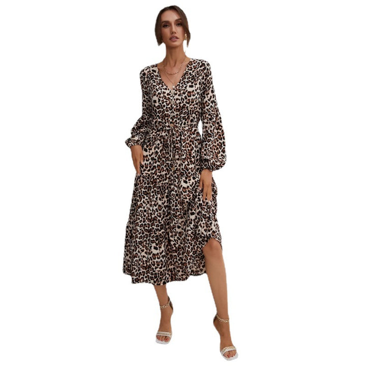 Women’s midi dress in leopard print with V-neckline, button placket, drawstring waist, and tiered skirt Mune Fashion