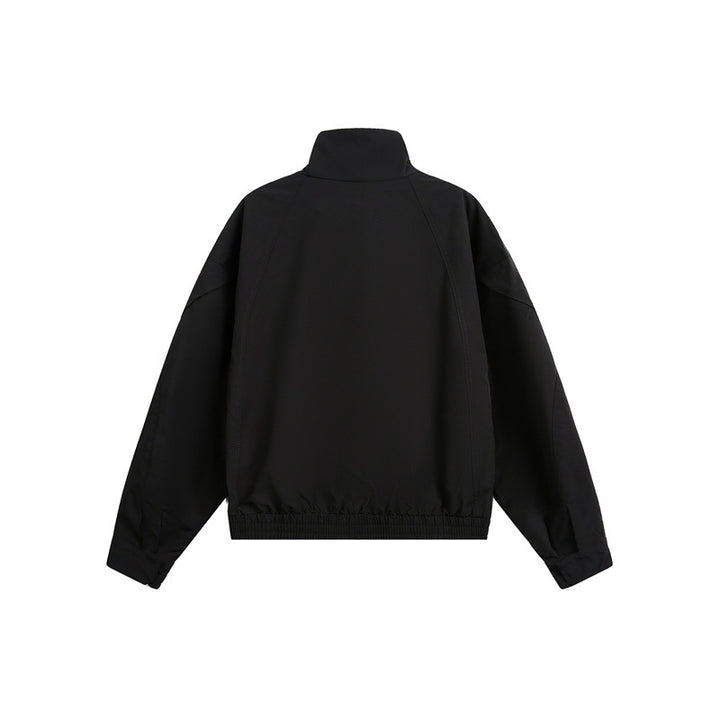 Unisex short jacket in minimalist tech fabric with funnel collar and concealed front placket Mune Fashion