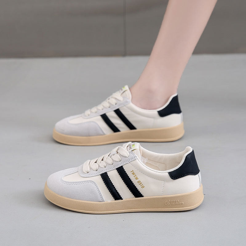 Ladies sporty sneakers with fashionable stripes and cushioned sole Mune Fashion