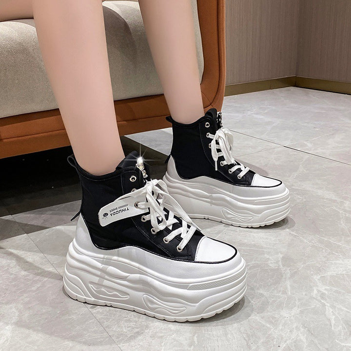 Ladies' platform sneakers with high shaft, lacing, and butterfly brooch Mune Fashion