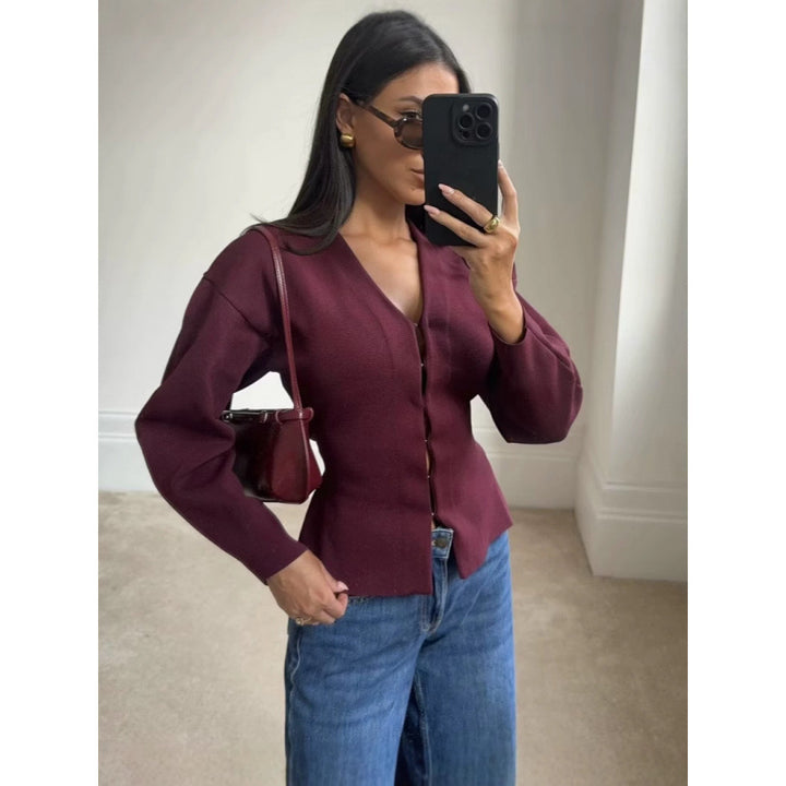 Women loosely fitted fine knit cardigan with deep V-neck and concealed button placket Mune Fashion