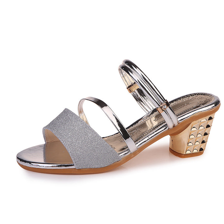 Ladies' shimmering strap slide with mid-height studded block heel and polished metallic footbed Mune Fashion