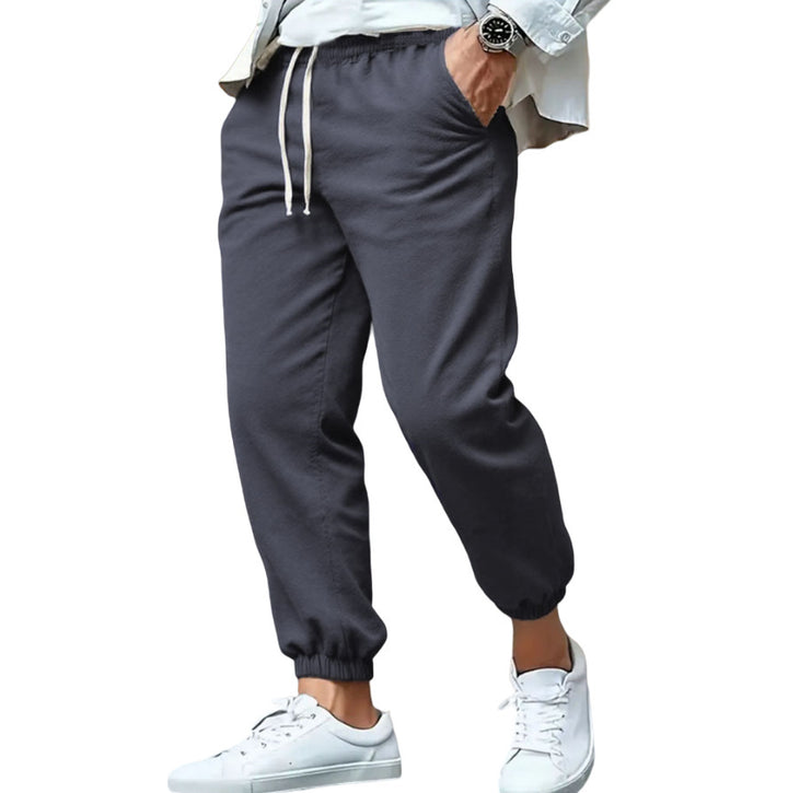 Men's nan tapered sweat joggers with elastic waistband, drawstring, and cuffed hems Mune Fashion