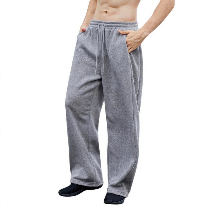Women's wide oversize jogging pants with a deep crotch, elastic waistband, and drawstring Mune Fashion