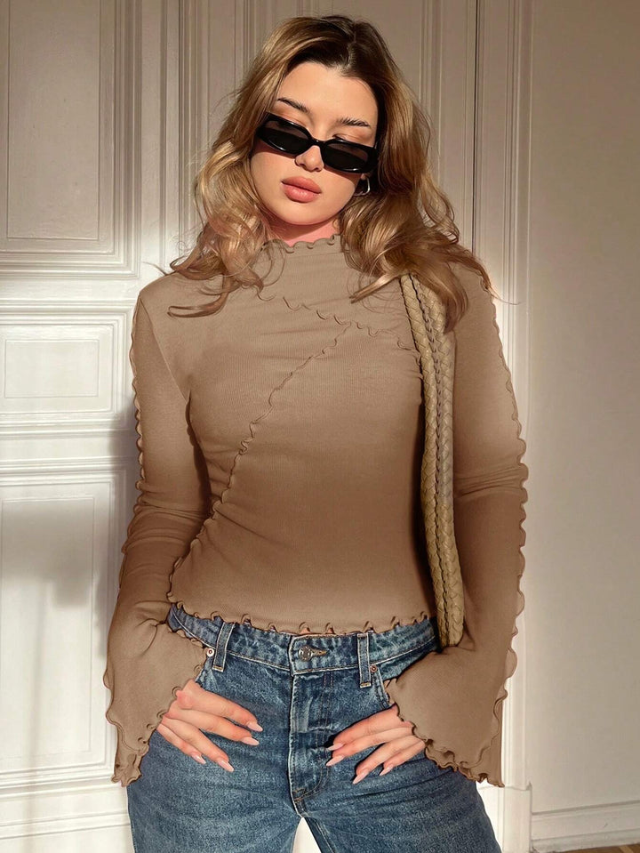 Women's Ribbed Long Sleeve Top with Ruffle Hem and Stand-Up Collar Mune Fashion