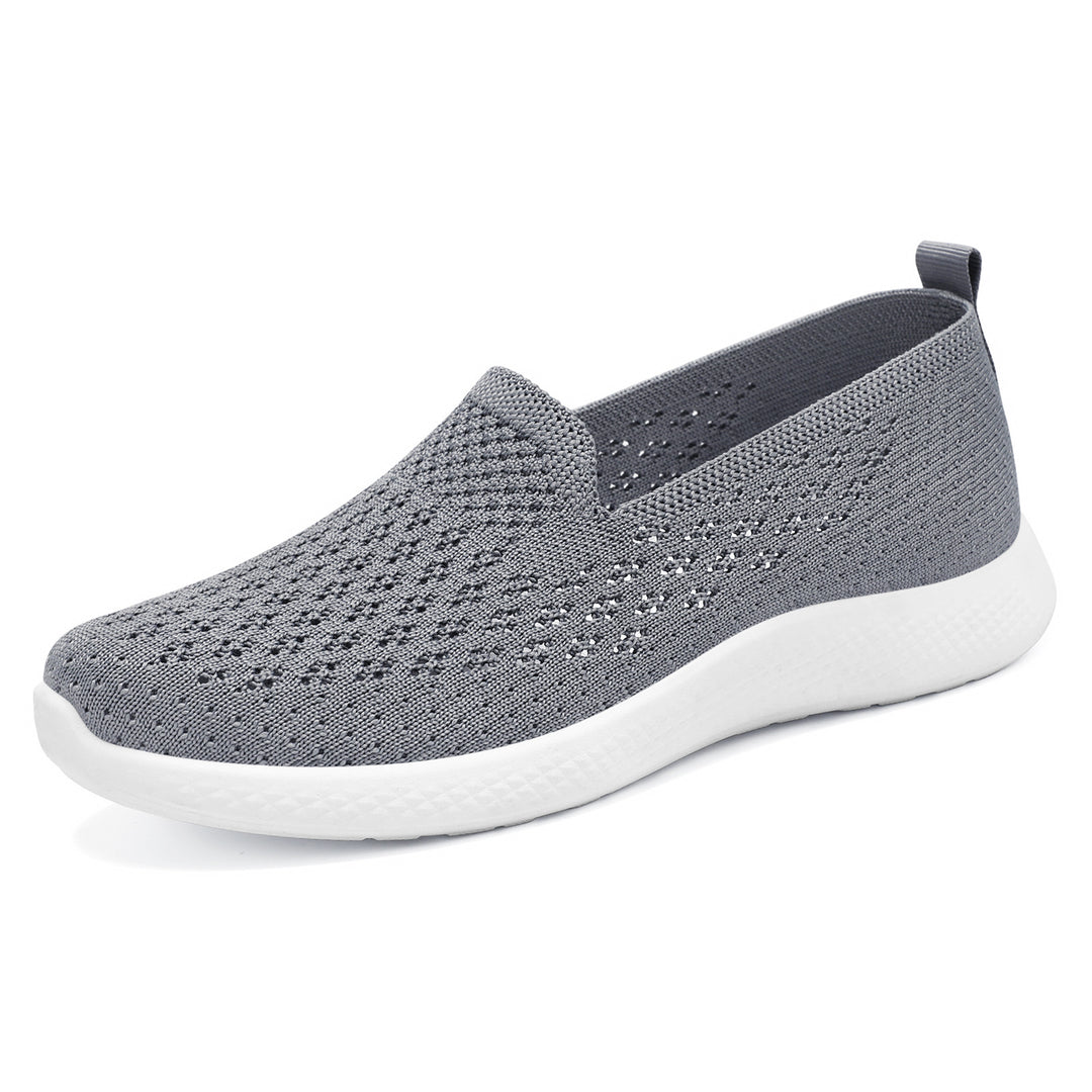 Women’s seamless knit slip-on with perforated air mesh structure, ergonomic memory footbed, and lightweight EVA cushioning Mune Fashion