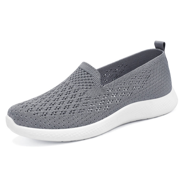 Women’s seamless knit slip-on with perforated air mesh structure, ergonomic memory footbed, and lightweight EVA cushioning Mune Fashion