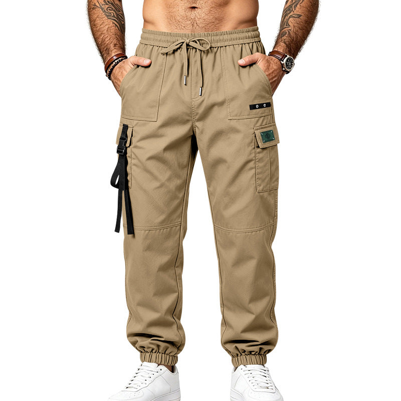 Men's utility cargo pants in jogger style with elastic waistband, multiple pockets and leg straps Mune Fashion