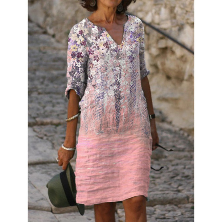 Women's knee-length midi dress in a material mix with floral lace surface, V-neck and crinkle texture Mune Fashion