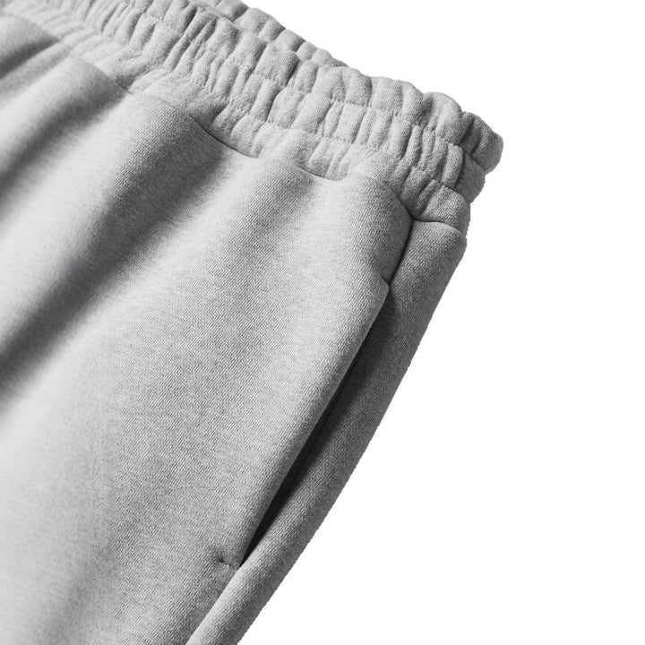 Unisex straight-cut jogging pants with a high elastic waistband and side inset pockets Mune Fashion