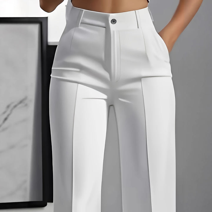 Women's high-waisted pleated trousers with wide leg and crease detail