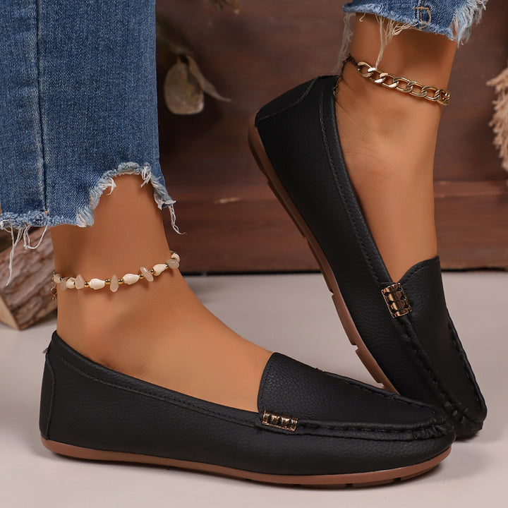 Women's slim moccasin slippers with hand-stitched front seam, padded comfort footbed, and flexible non-slip rubber sole Mune Fashion