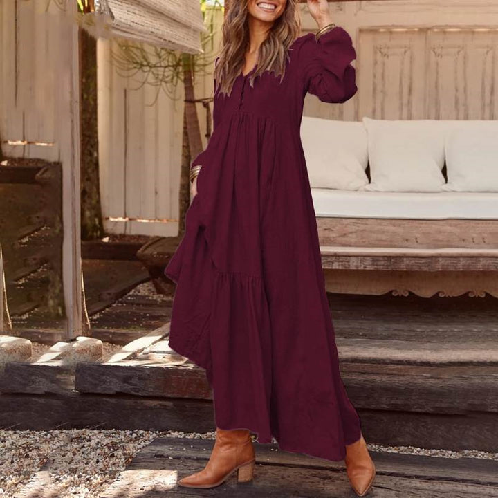 Women's airy maxi dress with V-neck, long sleeves, and inseam pockets Mune Fashion