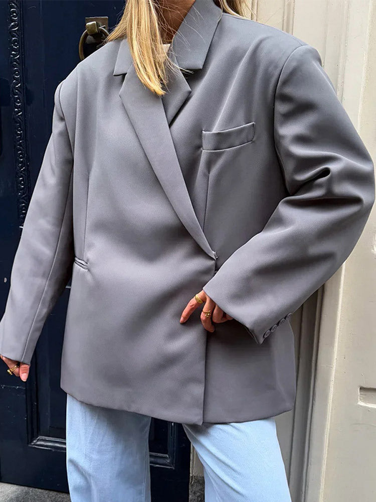 Women's oversized blazer with boxy silhouette, concealed closure and flap pockets Mune Fashion