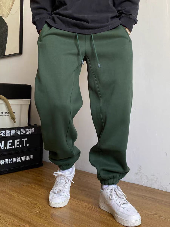 Men's nan tapered jogging pants with distinctive seam, drawstring, and elastic ankle cuffs Mune Fashion