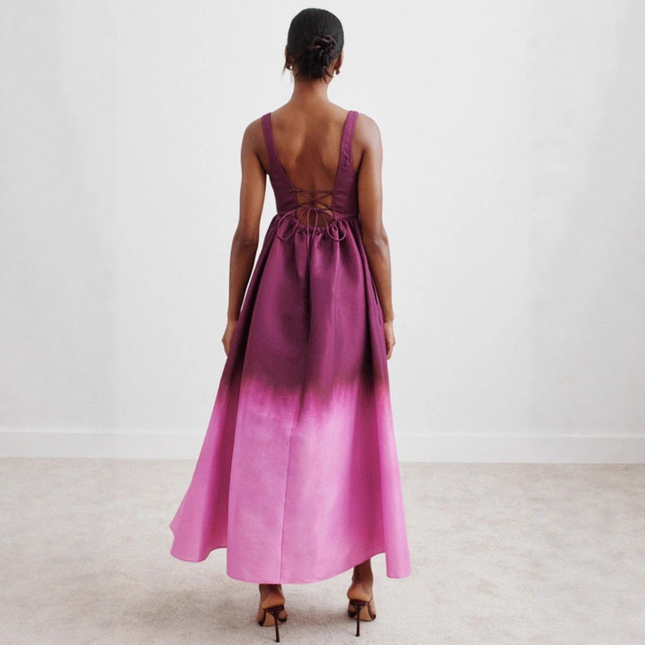 Women's floor-length bustier maxi dress with heart-shaped neckline, wide straps, and gathered empire waist Mune Fashion