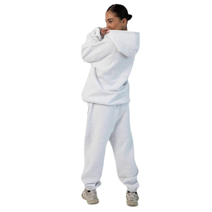 Women's casual sweatpants with high waistband, side pockets and elastic cuffs Mune Fashion