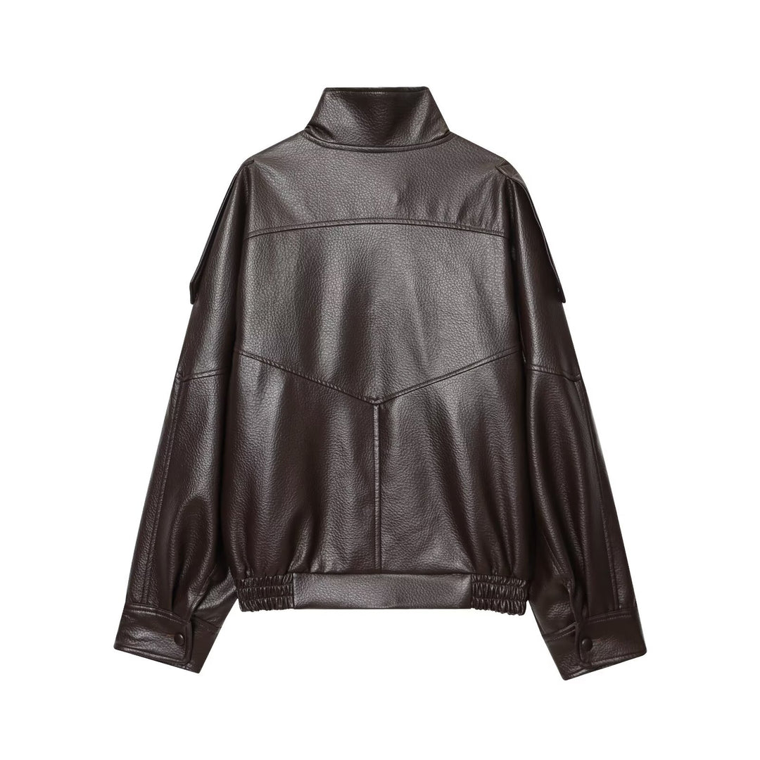 Women's faux leather bomber jacket with high stand collar, asymmetrical snap placket, and elastic hem Mune Fashion
