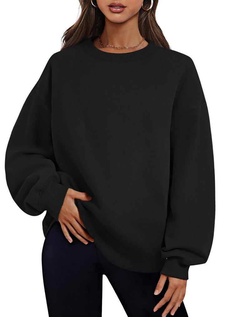 Women's extended oversized round neck sweater with side pockets, ribbed cuffs, and dropped shoulder Mune Fashion
