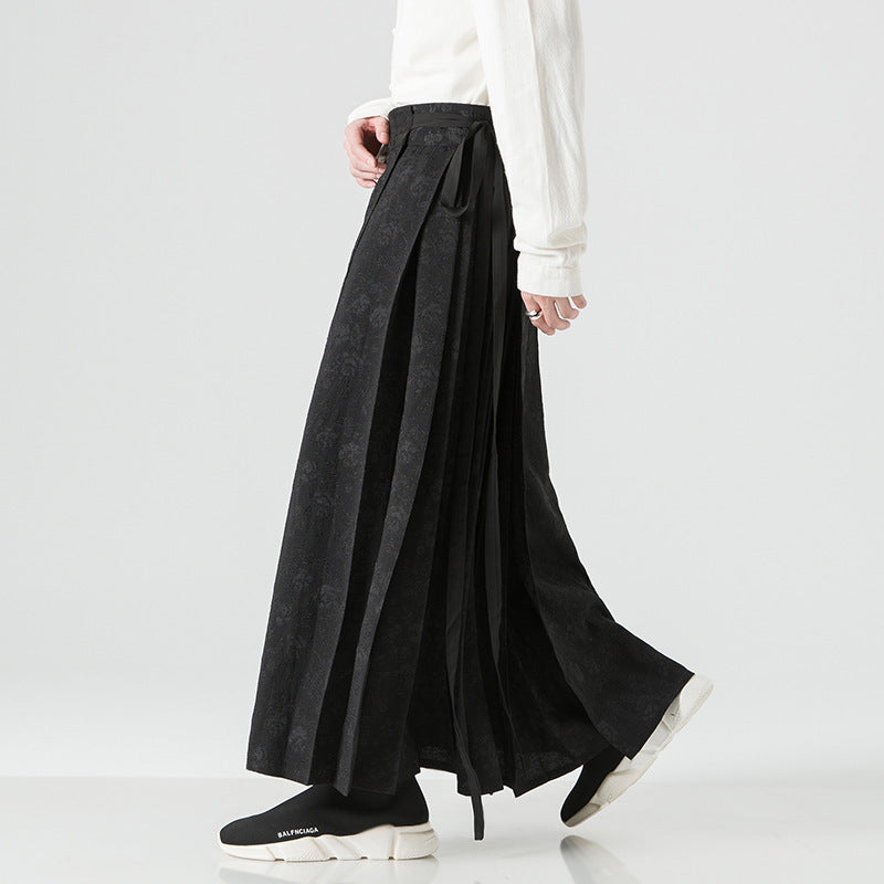 Women's maxi skirt with wide waistband, ornamental border and pleated folds Mune Fashion