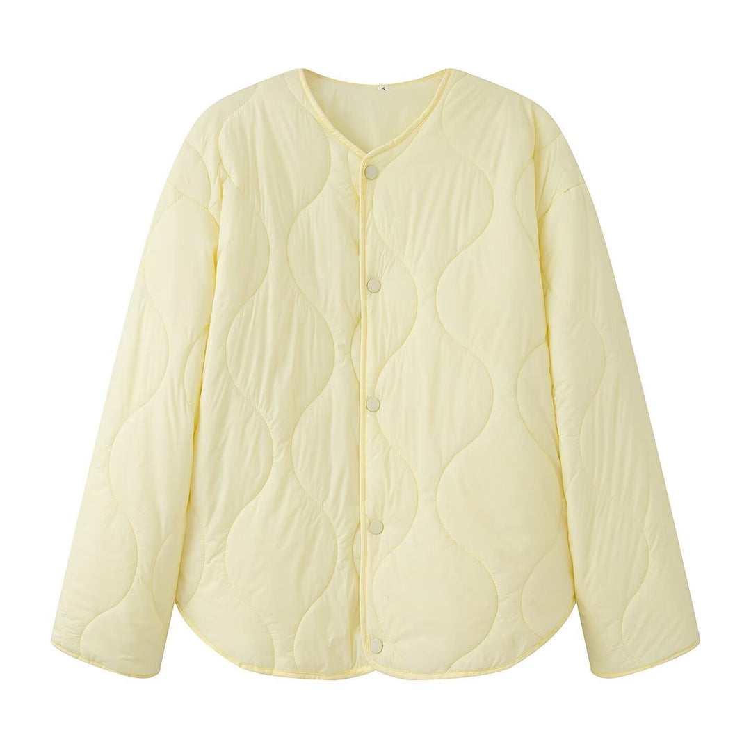 Women's quilted jacket with oversized cut, round neck and curved hem Mune Fashion