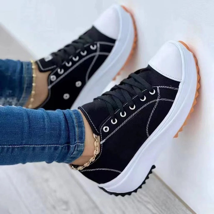 Women’s canvas platform sneaker with robust tread sole, toe cap, and lacing Mune Fashion