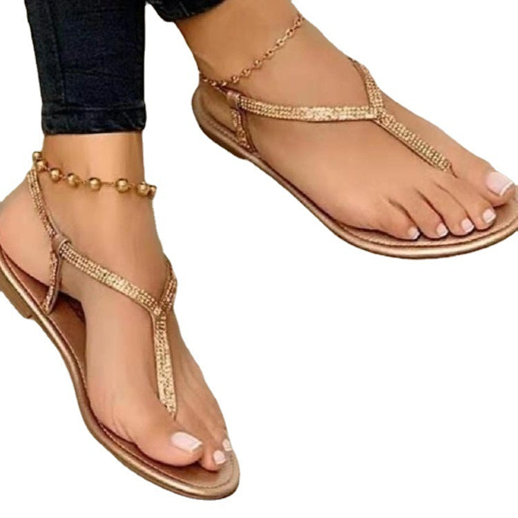 Ladies' T-strap sandal with sparkling rhinestone embellishment and padded comfort insole Mune Fashion