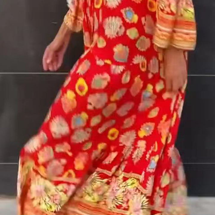Women's airy kaftan midi dress with folk-inspired border print, V-neckline, tassel ties, and flounce bell sleeves Mune Fashion