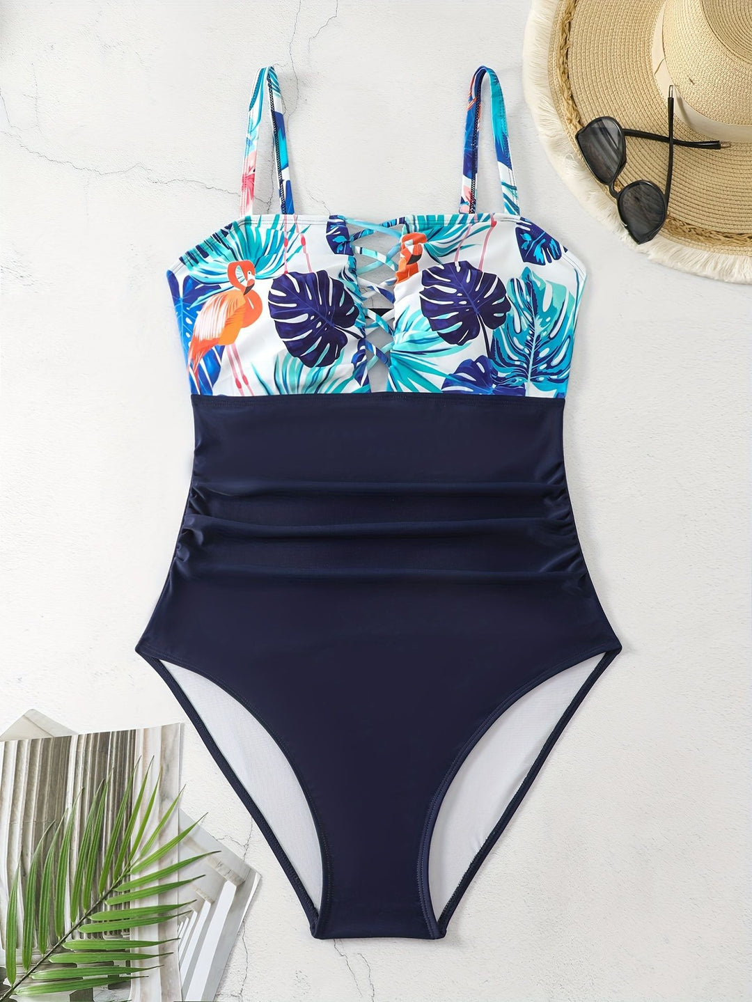 Women's one-piece swimsuit with sophisticated ruffle details and floral top Mune Fashion