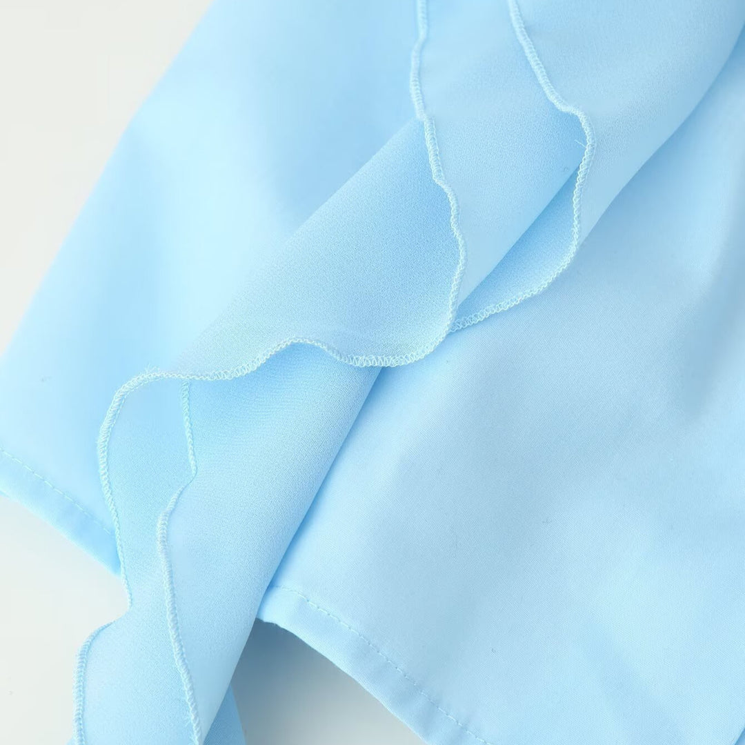 Ladies ruffle blouse with stand-up collar, ruffle details and waist belt Mune Fashion