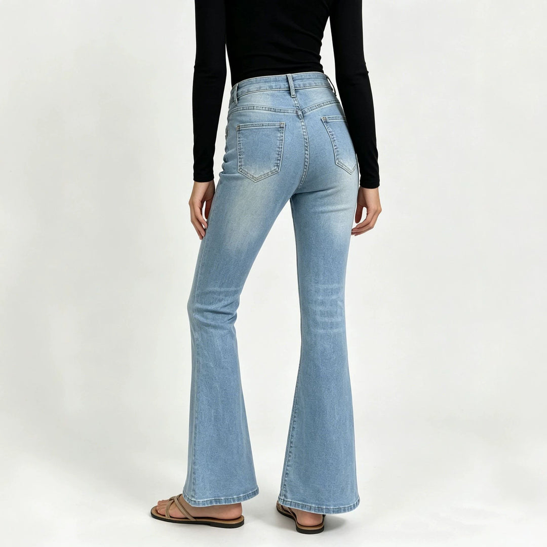 Ladies high-waisted jeans with a narrow hip area and wide flare with elastic waistband Mune Fashion