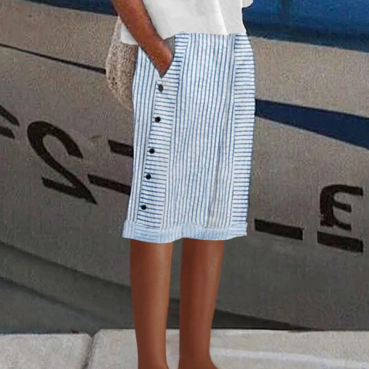 Women knee-length linen blend skirt with side button placket and side pockets Mune Fashion